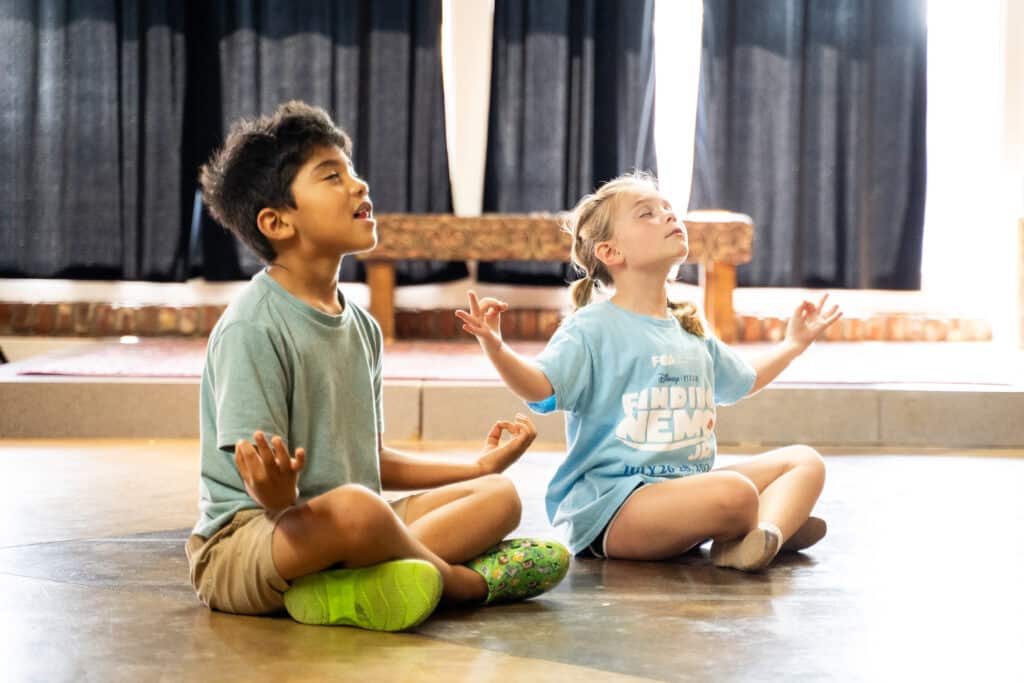 A young boy and girl in an acting class at The Arts Center